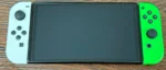 Nintendo Switch Console Bundle with Neon Green And White Joy-Con Pair - Image 4