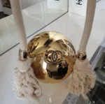 Chanel Gold Ball Minaudière Bag with Cream Rope Tassels CC Logo - Image 3