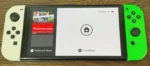Nintendo Switch Console Bundle with Neon Green And White Joy-Con Pair